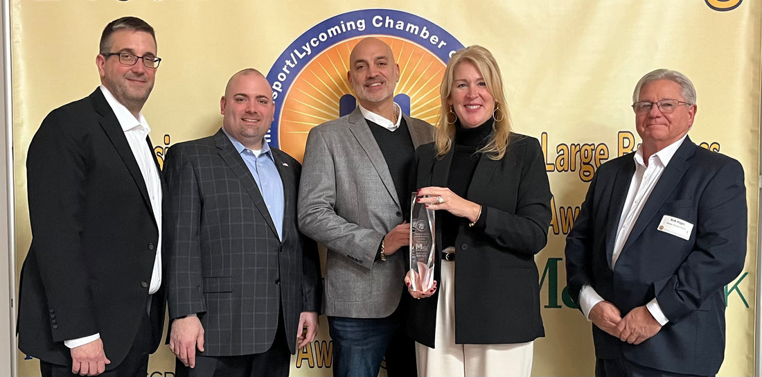 Miele Amusements was the Staiman Family Large Business 2025 Award Recipient, with Louis and Nicole Miele accepting the award from Carmen Magistro, regional president, M&T Bank, presenting along with Richard Staiman on stage.